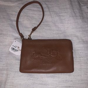 Never used brown coach wristlet